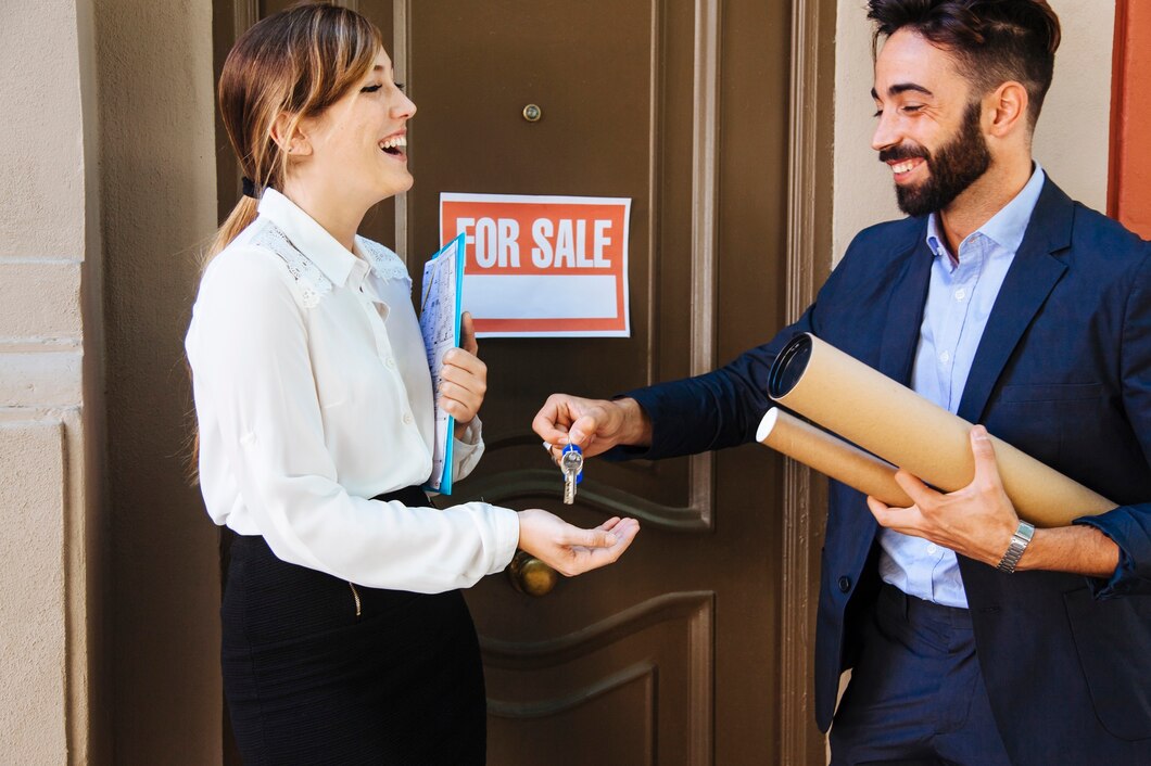 1743597046_real-estate-agent-giving-key-woman_23-2147653341.jpg